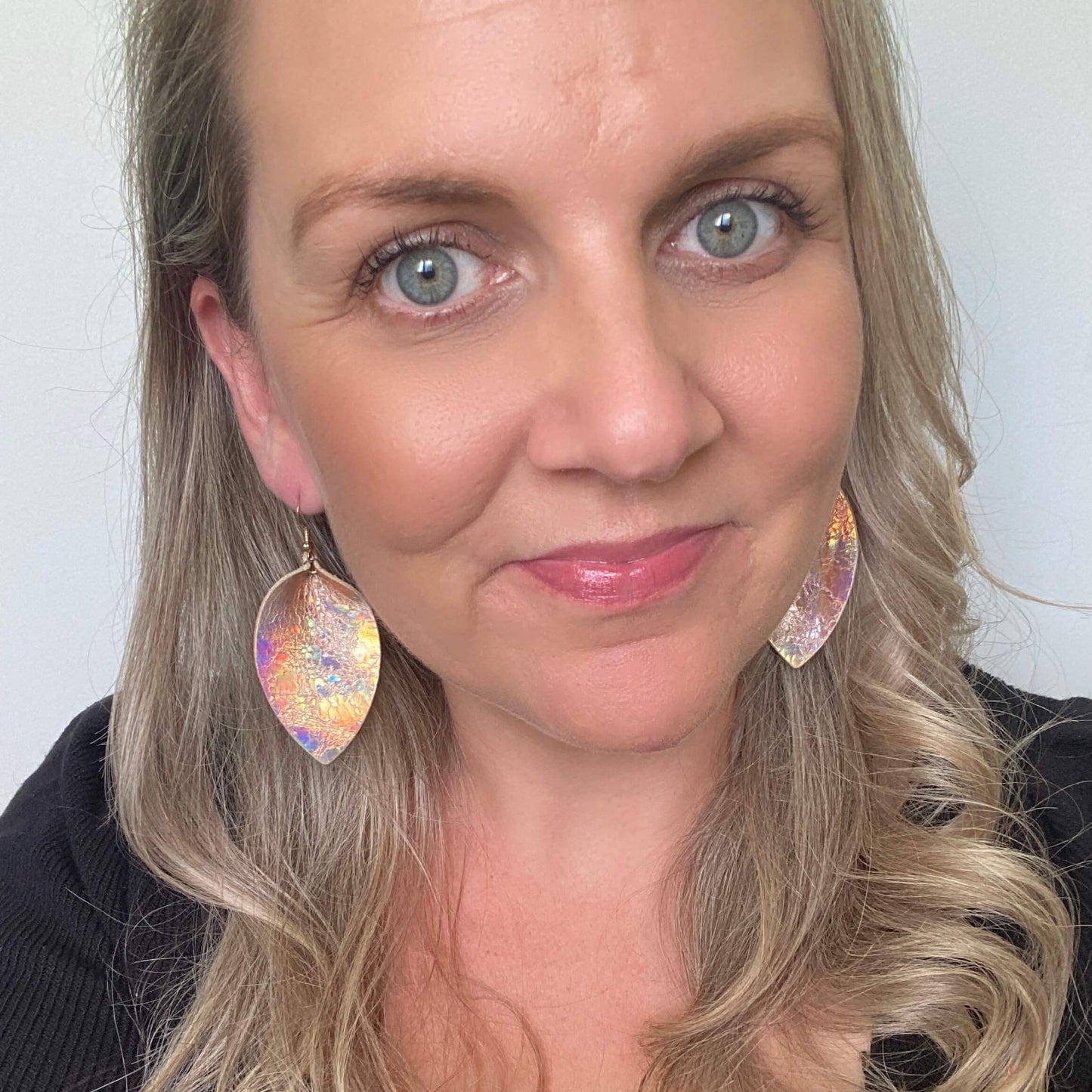 Rose gold holo petal leather earrings