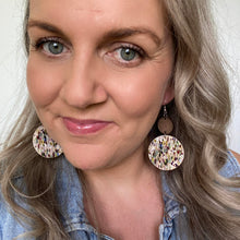 Load image into Gallery viewer, leather and timber circle earrings selfie
