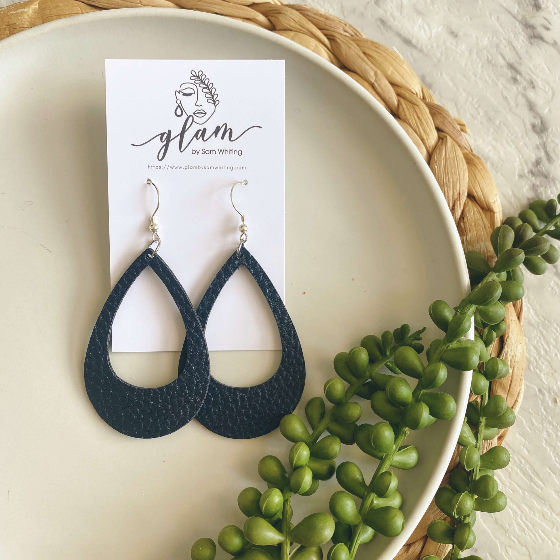 navy open teardrop leather earrings