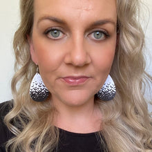 Load image into Gallery viewer, black and white halloween teardrop earrings on silver hooks.  bats selfie
