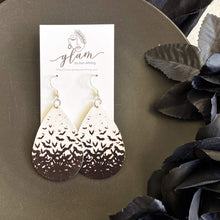 Load image into Gallery viewer, black and white halloween teardrop earrings on silver hooks.  bats
