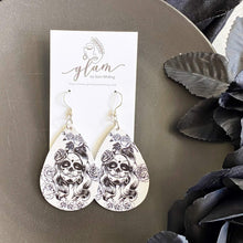 Load image into Gallery viewer, black and white halloween teardrop earrings on silver hooks.  sugar skull design
