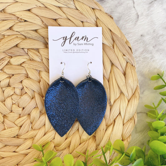 Navy blue metallic petal earrings. Leather with silver coloured hooks