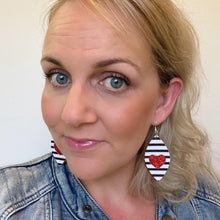 Load image into Gallery viewer, Black and White with Red Heart // Faux Leather Cut Out Earrings  with silver coloured hooks selfie
