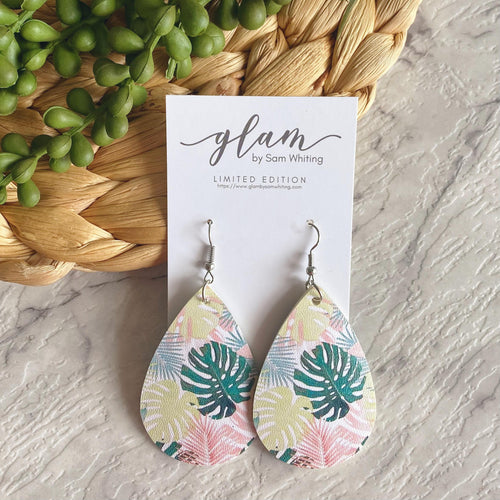 Monstera teardrop leather earrings with a silver coloured hook. 