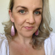 Load image into Gallery viewer, Girl Power Pink Metallic Droplet leather earrings on a silver coloured hook. 
