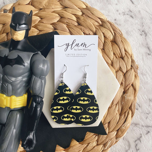 Batman inspired leather earrings with a silver coloured hook.