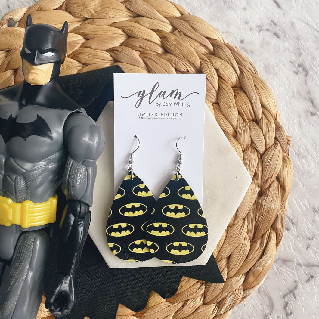 Batman inspired leather earrings with a silver coloured hook.