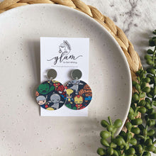 Load image into Gallery viewer, Large superhero stud leather earrings
