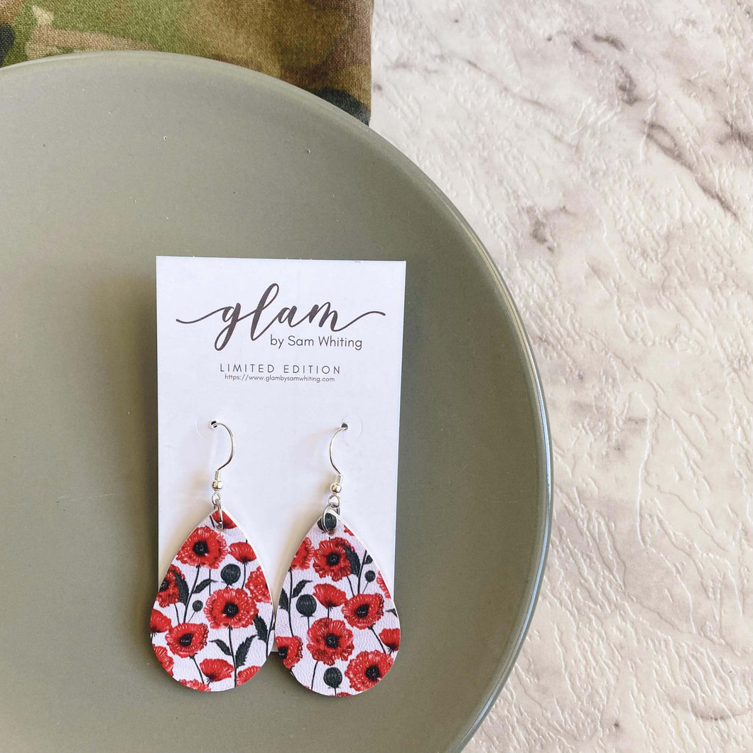 Mini poppy faux leather earrings with a silver coloured hook. Anzac and remembrance day
