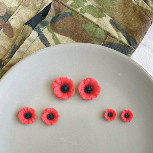 Resin Poppy studs with hypoallergenic stud posts.