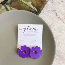 Load image into Gallery viewer, Purple Poppy hoops. Double sided faux leather with silver coloured hoops.
