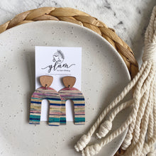 Load image into Gallery viewer, Beach Arch Stud Dangle leather earrings with a silver coloured hook. 

