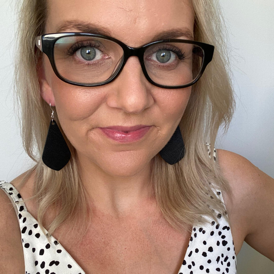 Black diamond drop leather earrings with silver coloured hook.