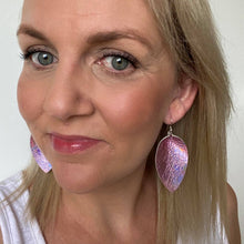 Load image into Gallery viewer, Pink holographic petal earrings.. Leather with silver coloured hoops.
