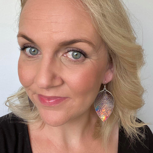 Grey holographic petals with silver coloured hook selfie