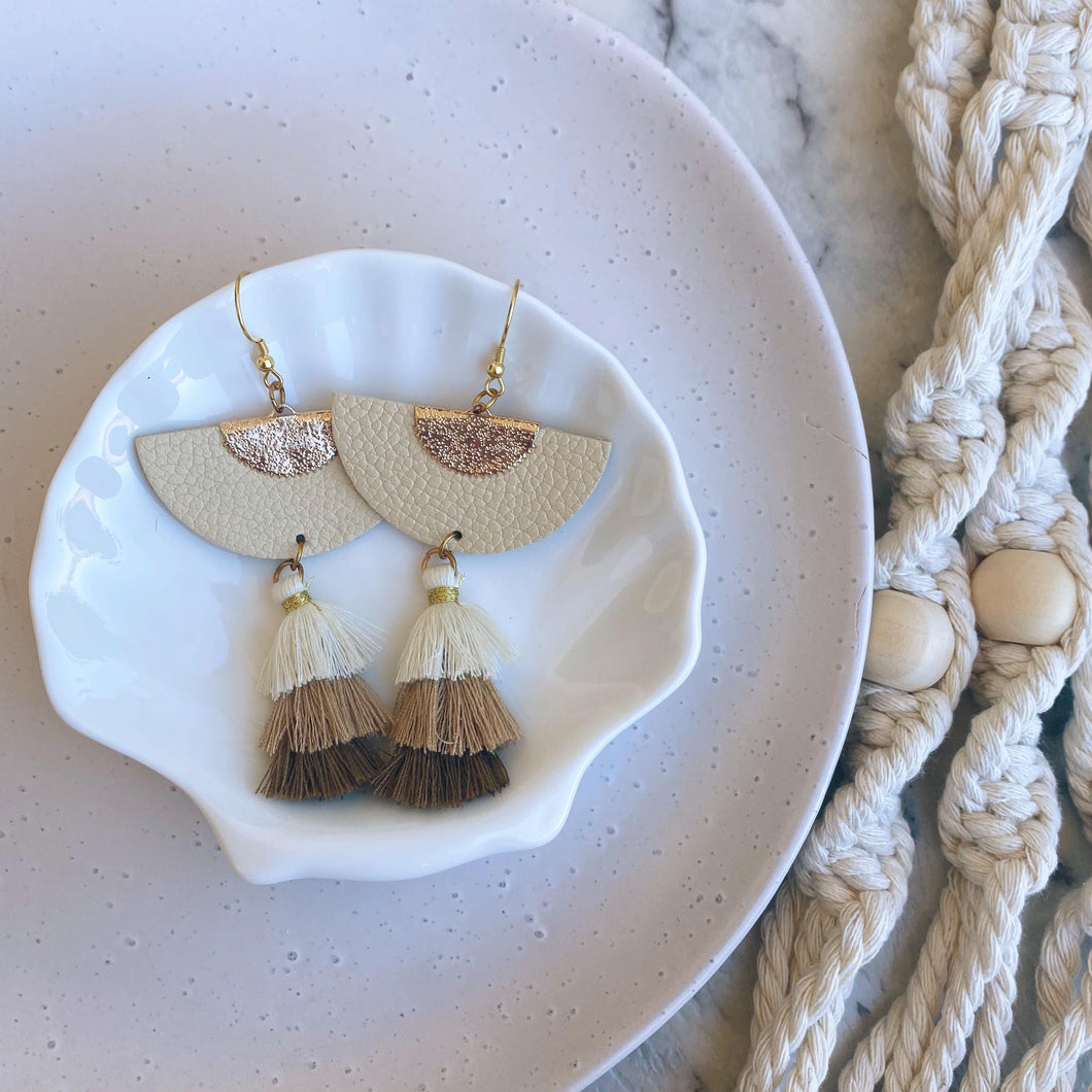 Ivory Party Tassels leather earrings with gold coloured hook.