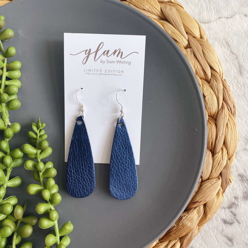 French navy metallic droplet leather earrings with a silver coloured hook. 