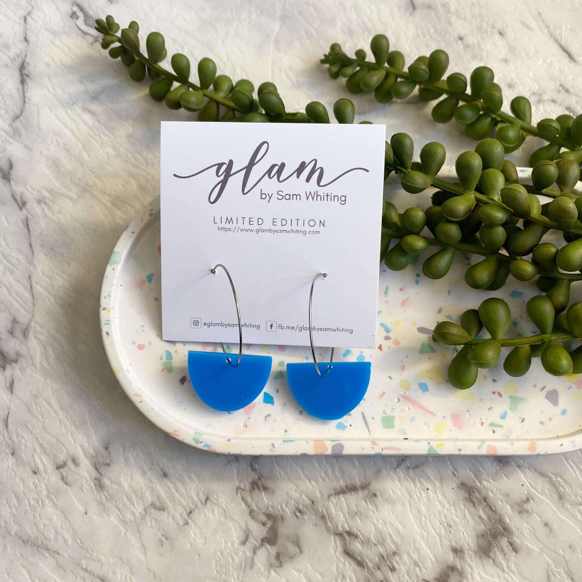 Neon Blue acrylic Arch earrings on a silver coloured hoop