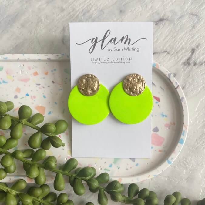 neon green Leather circle studs.