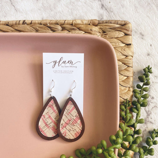 Framed Abstract pink leather earrings with a silver coloured hook. 
