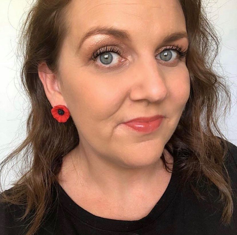 large Resin Poppy studs with hypoallergenic stud posts. selfie