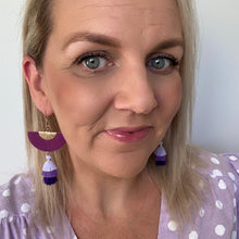 Load image into Gallery viewer, Purple Party Tassels. Leather earrings with a gold coloured hook. Selfie
