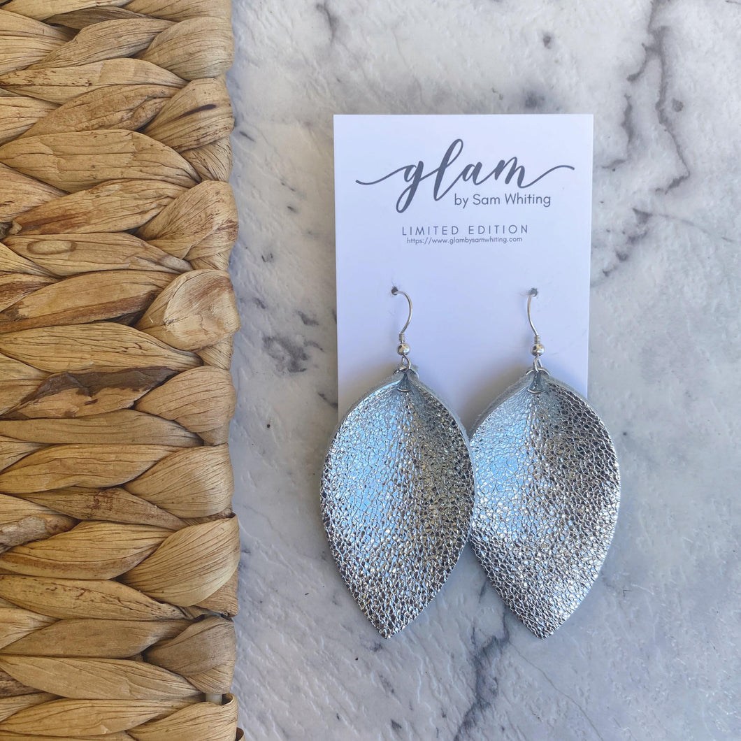 Silver Metallic Petals. Leather earrings with silver coloured hook.