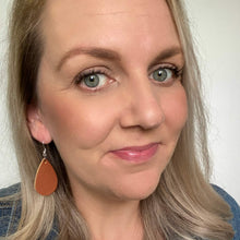 Load image into Gallery viewer, Tan mini teardrop leather earrings with a silver coloured hook. 
