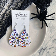 Load image into Gallery viewer, Halloween teardrop earrings on a silver coloured hook trick or treat
