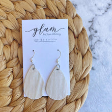 Load image into Gallery viewer, Pearl Embossed Mini leather earrings with silver coloured hook.
