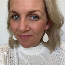 Load image into Gallery viewer, Pearl Embossed Mini leather earrings with silver coloured hook.
