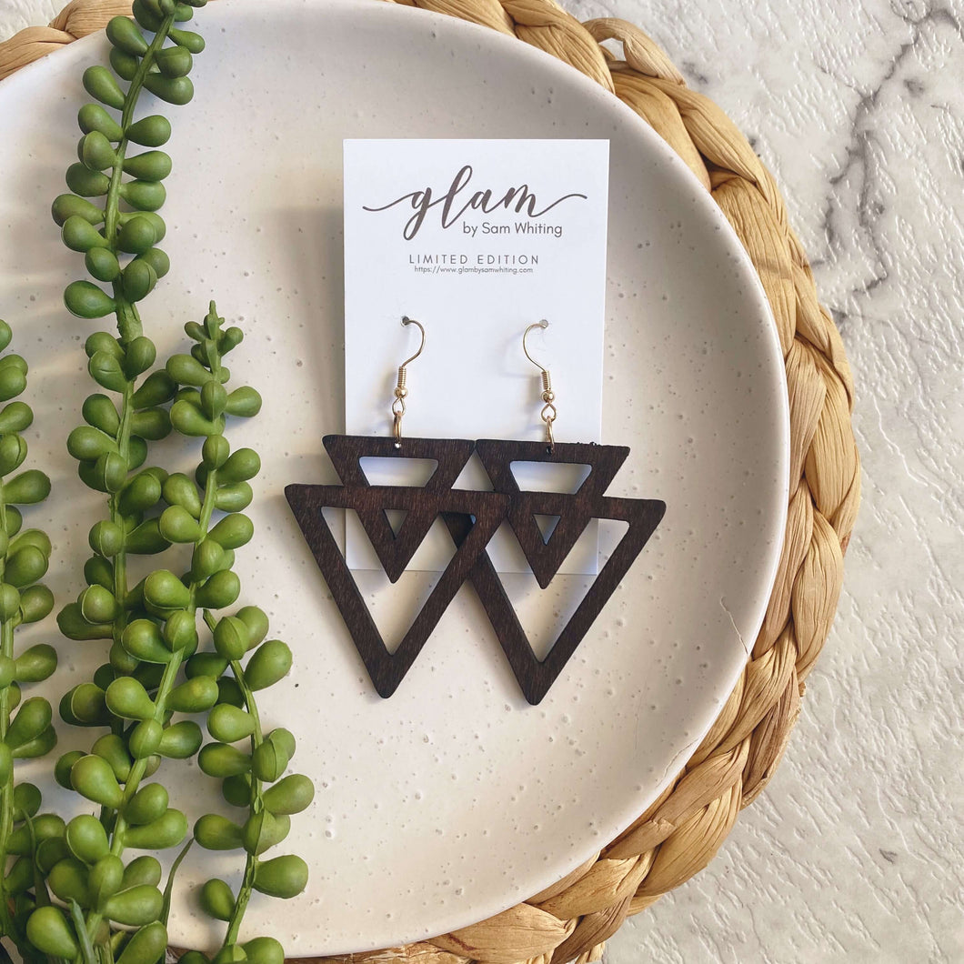 Timber Aztec Triangle shaped leather earrings on a gold coloured hook.  